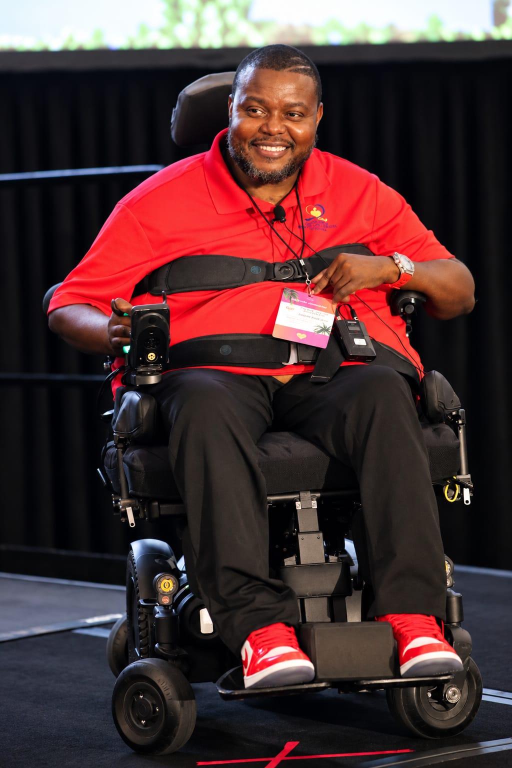 Lamont D. McLeod smiling while speaking on stage