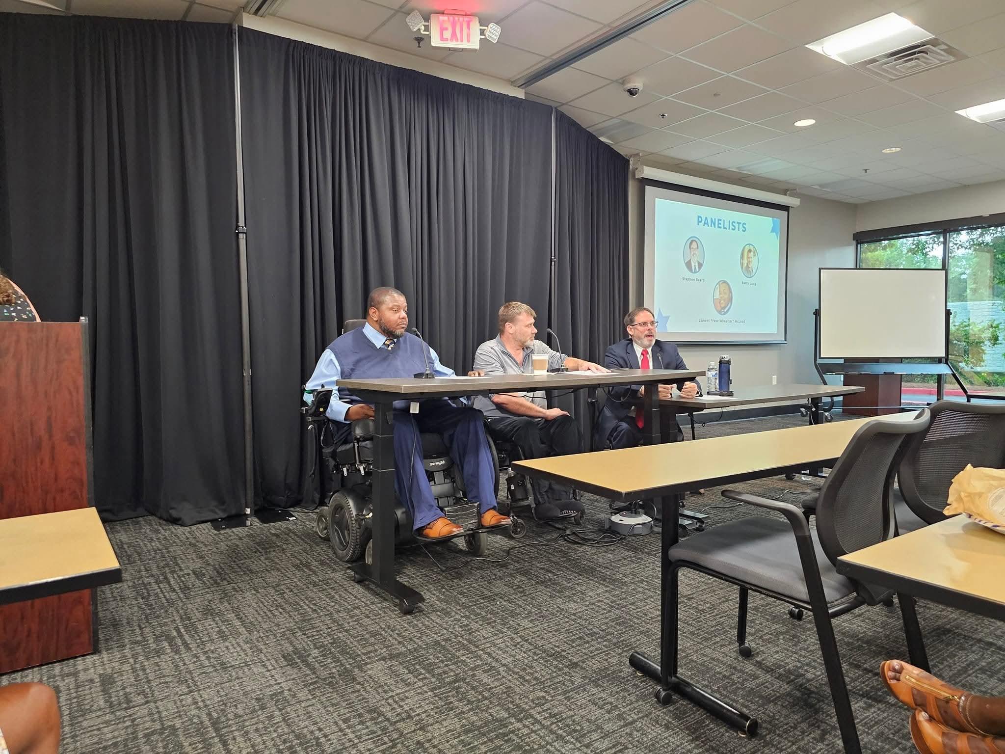 Lamont participating in a panel